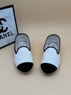 Authentic CHANEL White Leather Ballet Flats with Black Cap Toe